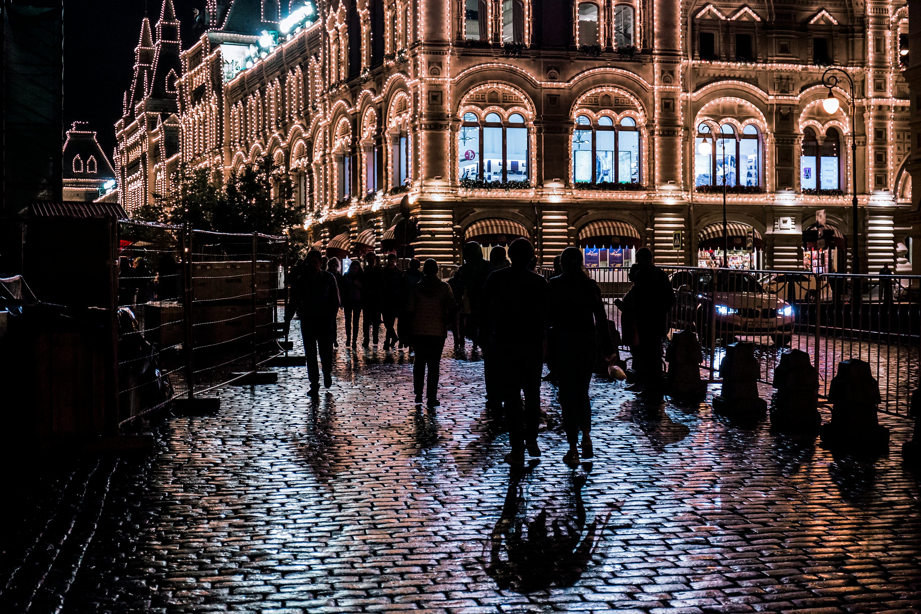 people walking near outdoor during nighttime